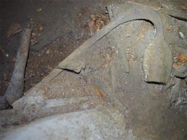 A kindu, traditional ritual gabonese bell. Next to the kindu are some human long bones. (NOT Engineers)