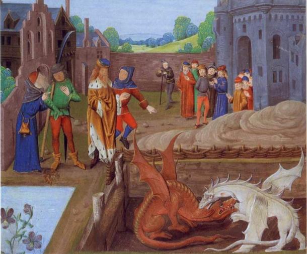 Illumination of a 15th century manuscript of Historia Regum Britanniae showing king of the Britons Vortigern and Ambros waching the fight between two dragons