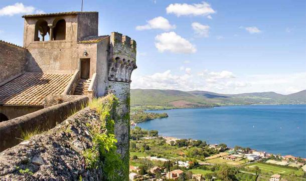 Lake Bracciano, where the now sunken village of La Marmotta was discovered, as seen from Bracciano Castle. It was here that archaeologists unearthed the oldest Neolithic boats. (Luca Lorenzelli / Adobe Stock)