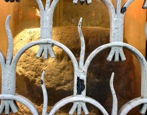 London Stone, seen through its protective grille. 