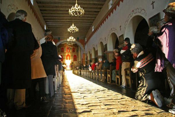 The 2007 midwinter solstice illumination of the main altar tabernacle of Old Mission San Juan Bautista, California. Rubén G. 