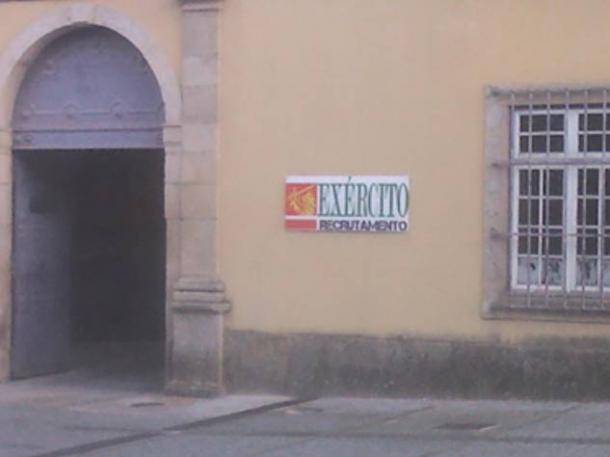 A sign which reads ‘military recruitment’.