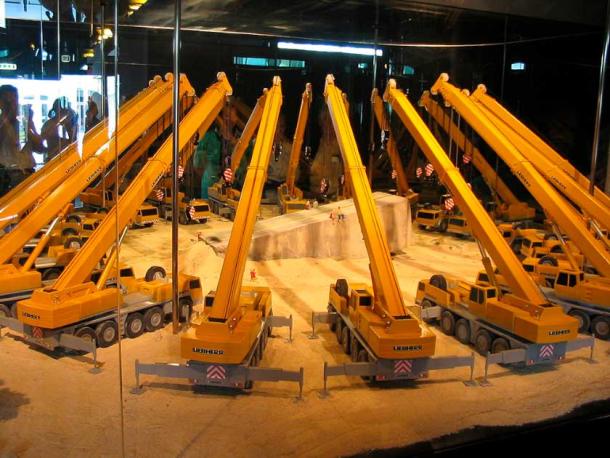 A model at Jungfrau Park in Interlaken, Switzerland, which demonstrates the number of modern cranes needed to lift the Stone of the Pregnant Woman. (Krischan74 / CC BY-SA 3.0)