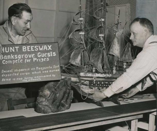 A model of the Santo Cristo de Burgos Spanish galleon that was on its way from the Philippines to Mexico in 1693 when it was blown off course and sunk in Oregon coastal waters. Manzanita Mayor Ben Lane with a model of the Santo Cristo de Burgos in a photo from 1951. (Oregon Historical Society Research Library)
