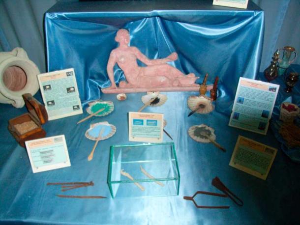 A nude reclining Aphrodite and Ancient Roman and cosmetics and beauty care: unguents, perfumes and makeup. Paints often came from the Orient, particularly Egypt, famous for its eyeliners. Lipstick and facial color powders were used, including Oriental imports of expensive unguents. (Notafly / CC BY SA 3.0)