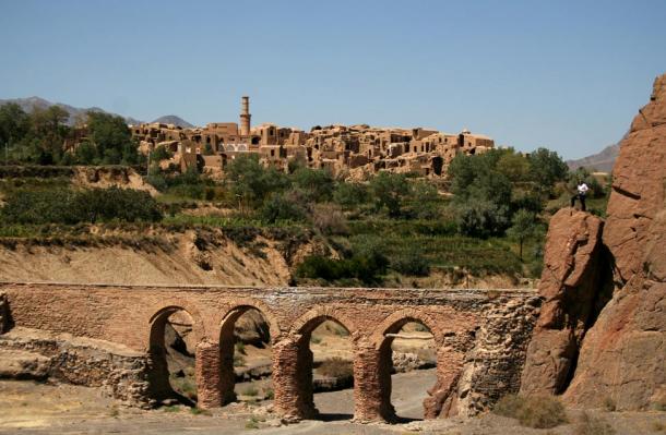 The old bridge of Kharanaq, with the Old Town in the background.