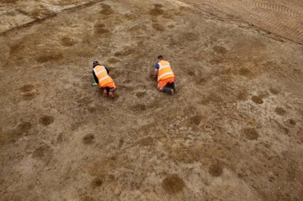 One of the six Late Bronze Age to Early Iron Age timber roundhouses that was discovered, with visible postholes. (Cotswold Archaeology)