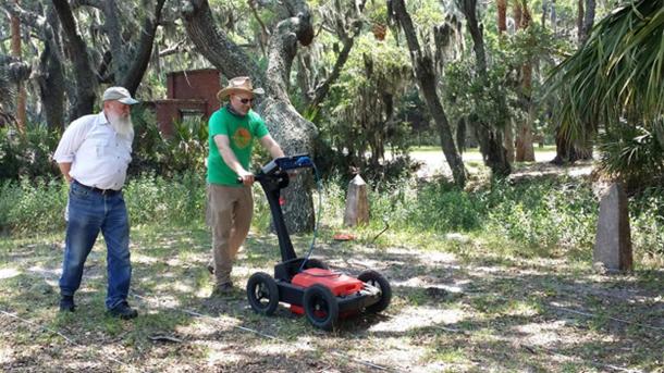 Chester DePratter (left) and Victor D. Thompson (right) run ground penetrating radar at Santa Elena. 