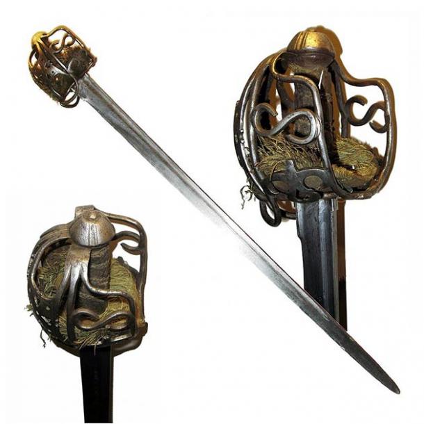 An example of a “perfect” basket-hilted broadsword that is similar to the one Fionntan Hughes found with his new metal detector in Northern Ireland. (Rama / CC SA-BY 2.0)