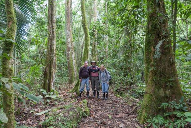 Scott, John and Wendy break from hiking to snap a photo in the rainforest.