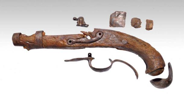 A pistol underwater archaeologists found aboard the ship Mentor. 