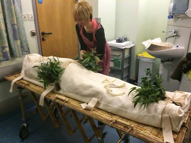 Some people today still like to place rosemary and other herbs on a deceased body (shrouds4all)