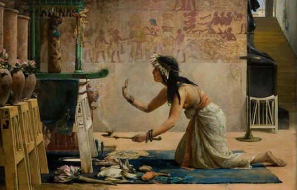 A priestess performing a ceremony. 'The Obsequies of an Egyptian Cat' by John Reinhard Weguelin.