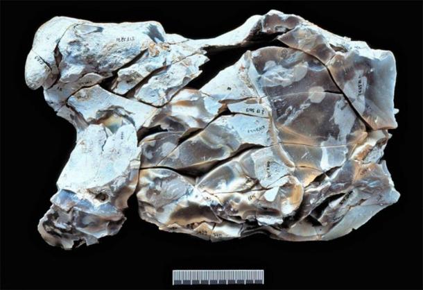 The process called re-fitting, where archaeologists put together shards left over from making a tool in order to reveal the shape of the tool by casting the remaining void, was employed at the Boxgrove site. This artifact, created with over 100 re-fitted flint shards, divulged the shape of the original hand axe. (UCL INSTITUTE OF ARCHAEOLOGY)