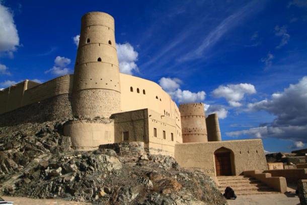 One of the protective round towers of Bahla Fort, Oman (Rudolf Tepfenhart/ Adobe Stock)