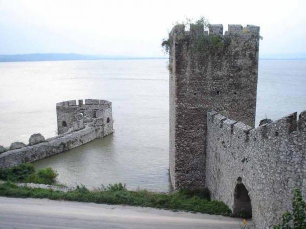 The rear gate and tower 5 on the right, and tower 10 on the left.