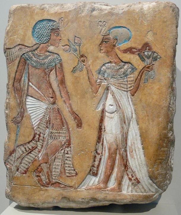 A relief of a royal couple.