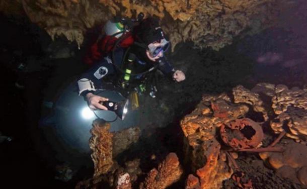 9,000-year-old remains of a man in a Tulum cenote. (Credit: Eugene Acevez, the Institute of American prehistory)