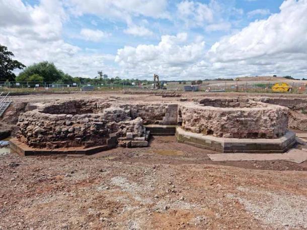 Remains of the large stone bases of two towers that were once part of a fortified gatehouse likely constructed more than 700 years ago. (HS2)