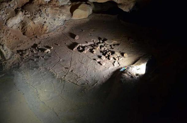 This image shows the removed earth which was discovered next to the Paleolithic Age footprints. (Gobierno de Cantabria)