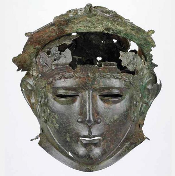The Ribchester Helmet. Romano-British copper alloy cavalry helmet with face-mask visor (1st – 2nd century AD). Decorated with a scene of a skirmish between infantry and cavalry. The helmet was found in Ribchester, Lancashire, in the northwest of England. The Ribchester Helmet was not used for combat but served either a sporting or ceremonial purpose. (Trustees of the British Museum / CC by SA 4.0)