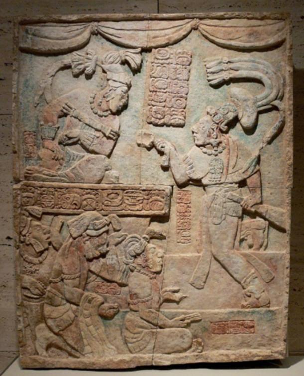 Classic period sculpture showing sajal Aj Chak Maax presenting captives before ruler Itzamnaaj B'alam III of Yaxchilan.