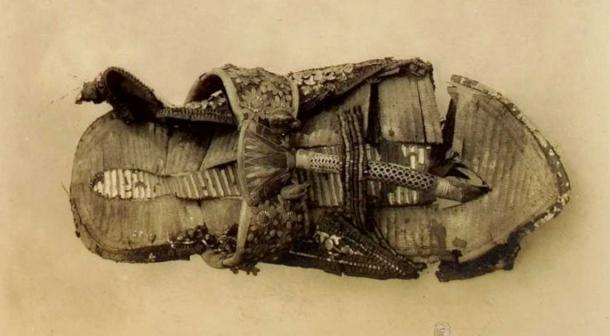 One of Tutankhamun’s sandals photographed within the tomb. (Public Domain)