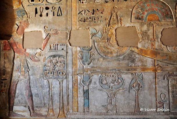 A scene on a wall in the mortuary temple of Ramesses III shows the king making an offering of incense and libation in front of a sacred bark of the deified Ramesses II. Medinet Habu.
