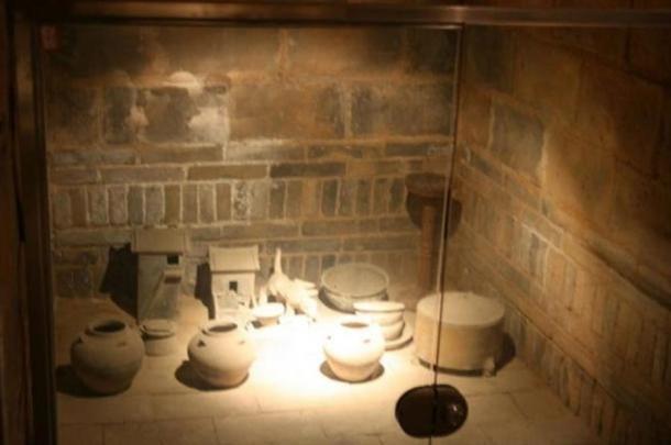 A sealed Chinese tomb with grave goods such as jars and miniature buildings, in Luoyang, Henan Province, China, built during the Eastern Han Dynasty (25–220 AD)