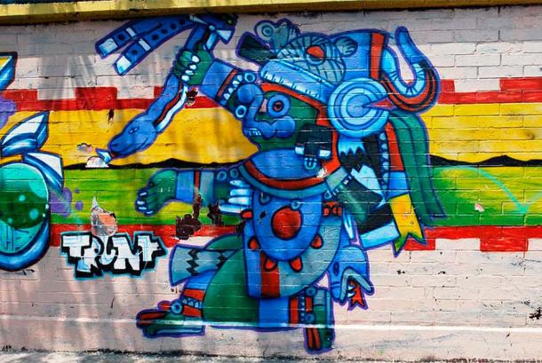 Mural section with Aztec deity, probably the Monolith of Tlaloc, on the outside wall of Millan Primary School in Mexico City (Thelmadatter/CC BY-SA 3.0)