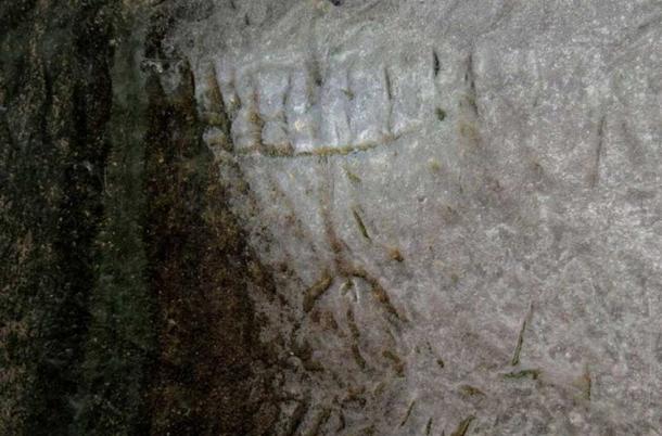 Engraving of a seven-branched menorah found at the site. 