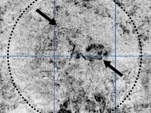 The signals from the georadar surveys with the perimeter of the mound indicated. A somewhat disturbed, ship-shaped pattern can be seen northeast of the center of the mound. (Museum of Archaeology, University of Stavanger/Science Norway)