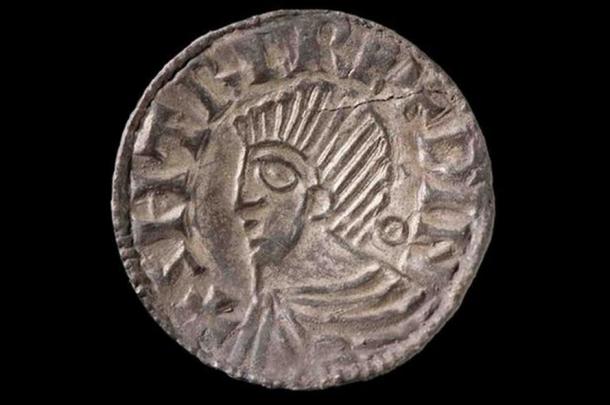 The treasure found by a Welshman with a metal detector includes silver pennies and coin fragments from the time of King Cnut of England and Scandinavia.
