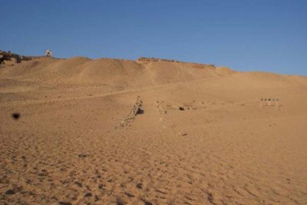 The site before the wall was unearthed.