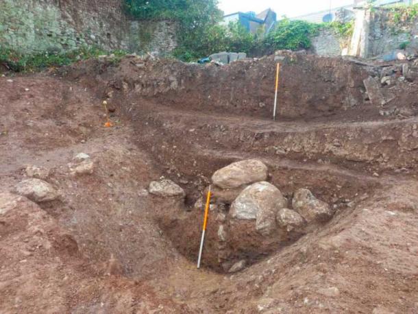 The skeletal evidence the bone expert analyzed were found at the bottom of this pit, a considerable distance under the original old pub. (© John Cronin & Associates)