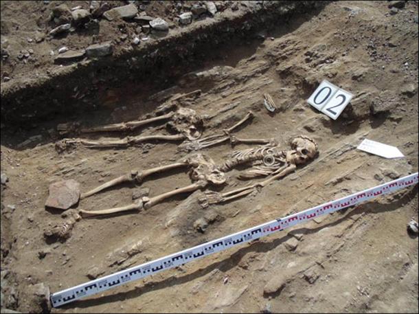 man's skeleton had a ring made of rare white jade over one eye socket. 