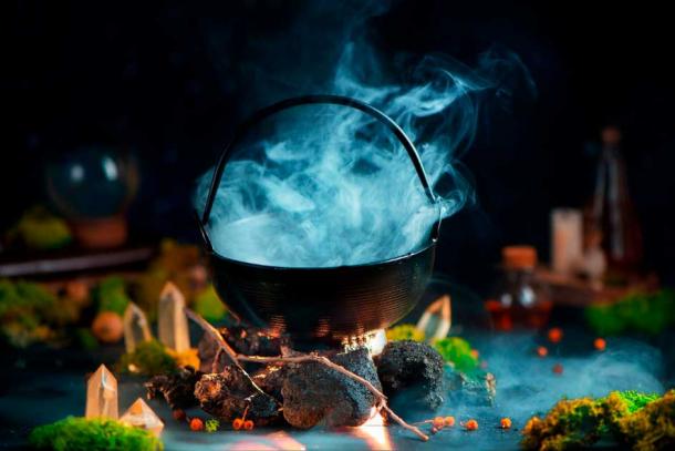 The smoking cauldron common in depicting all witches (DinaBelenko/Adobe Stock)