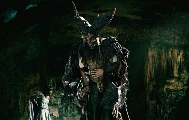 A spooky devil with a victim.