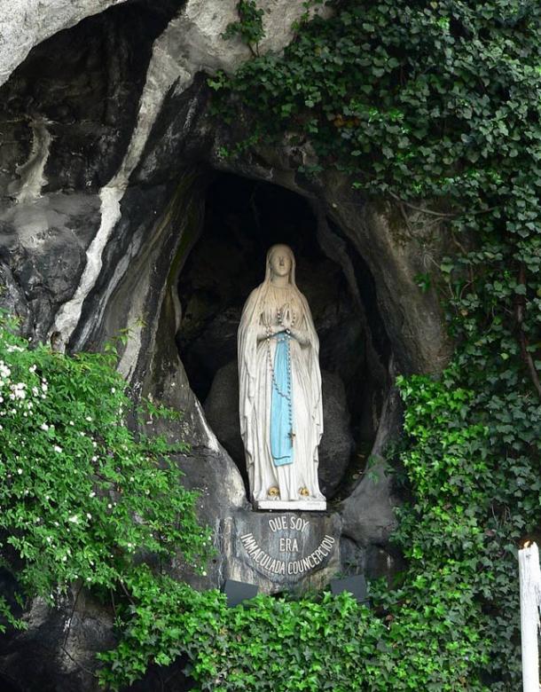 The famous statue of Our Lady of Lourdes in the Grotto
