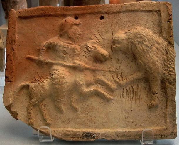 A stone-etched relief depicting a Parthian cataphract fighting against a lion. Housed in the British Museum. 