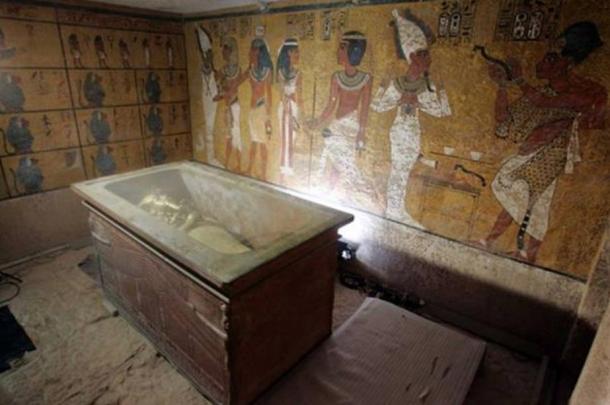 The stone sarcophagus containing the mummy of King Tut is seen in his underground tomb