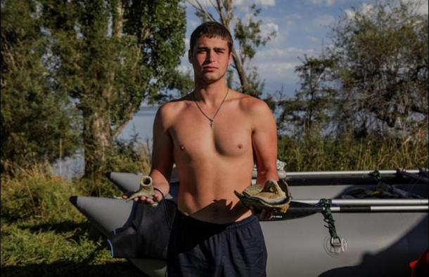 Dozens of artifacts were raised from the lake, which was located on the ancient Old Silk Road.