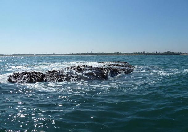 Part of one of the submerged temples reportedly visible during low tide. Mahabalipuram, India.