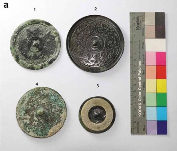 The back surface of the bronze mirrors shoes the detail of the decoration, which included symbols and ancient Chinese scriptures. (Jiafang Liang & Quentin Parker / Heritage Science)