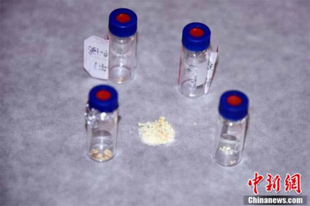 Samples of the residues of synthetic white lead cosmetics found in a bronzeware excavated from a tomb in Liangdai village, northwest China's Shaanxi Province. (China News Service/Sun Zifa)