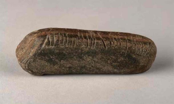 The ogham stone, 11cm long and weighing 139g, was found in an overgrown garden. (The Herbert Art Gallery and Museum)