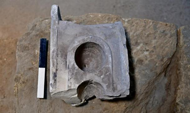 The top part of the measuring table found at the excavation site of the ‘ancient Jerusalem market’. (Ari Levi / Israel Antiquities Authority)