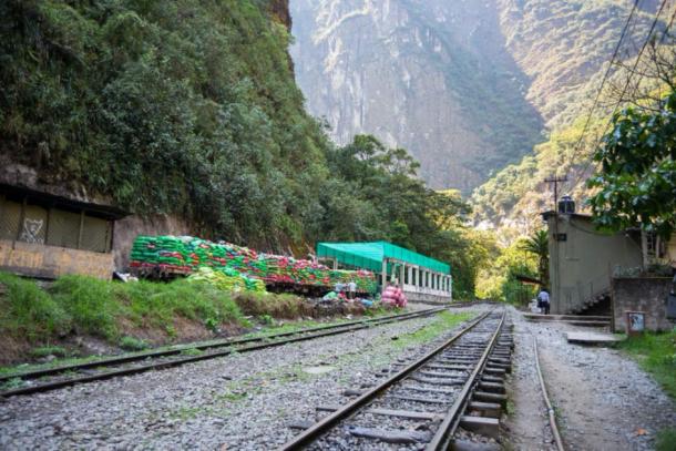 Machu Picchu trash crisis - Garbage train ready to travel out of Machu Picchu, Peru. (fabio lamanna / Adobe stock)
