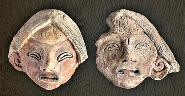 The two female heads modeled in unbaked clay.