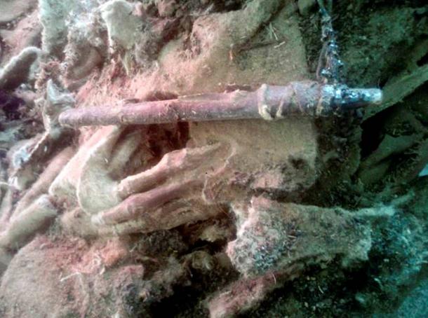 Now we are carefully unwrapping the body and the specialists could say more precisely about the gender.